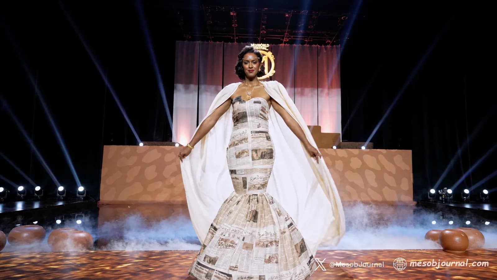 Snit wearing a gown designed by Ali Mohammed of A|G Habesha.