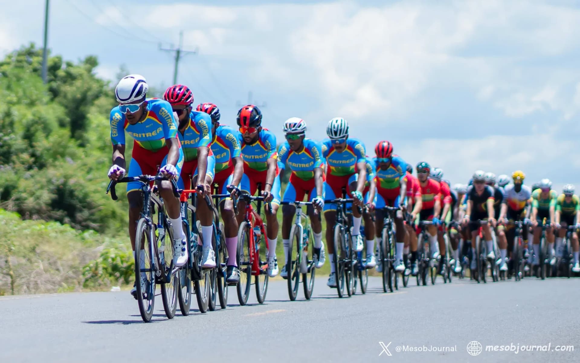 Eritrean cycling team leads the peloton during a road race.